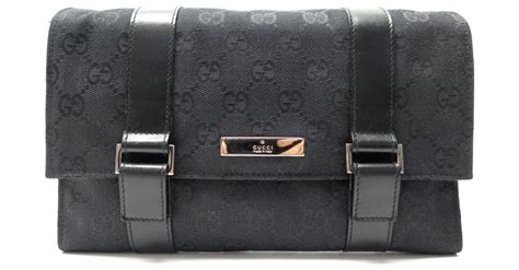 Trousse de toilette GG Supreme en toile en noir – Gucci.